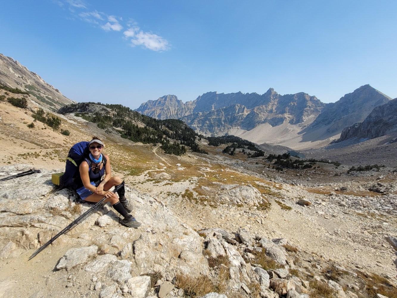 a man riding on top of a mountain